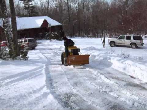 GE General Electric Elec-trak E15 tractor Plowing snow