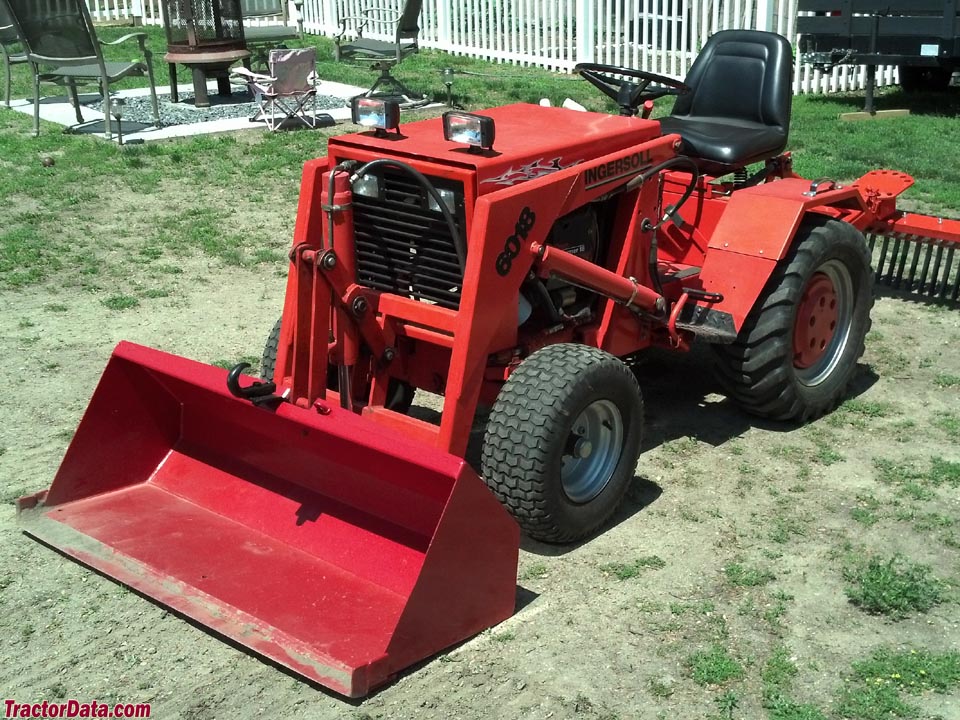 Ingersoll 6018 with front-end loader and landscape rake. Photo ...