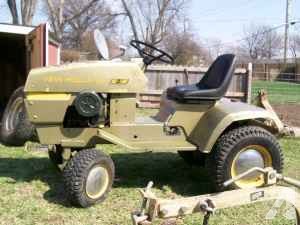 1974 New Holland s-16 garden tractor and attachments - (Beatrice Ne ...