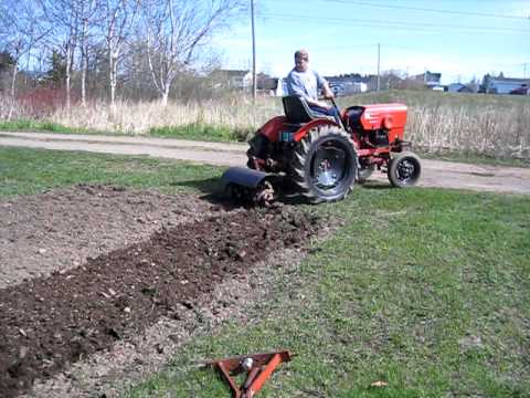 2416 Power King tractor with rototiller - YouTube