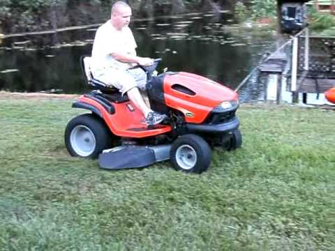 Scotts L2548 25HP lawn tractor mowing the yard - YouTube
