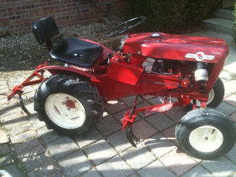 My 1961 Wheel Horse 701 with two piece cultivator set and Hein-Werner ...