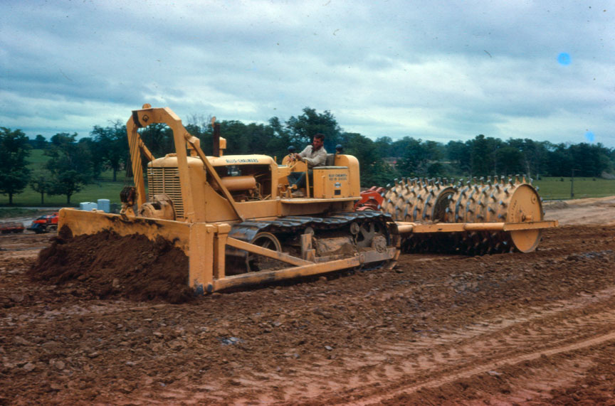 Allis-Chalmers HD-19 pulling sheeps foot roller about 1963