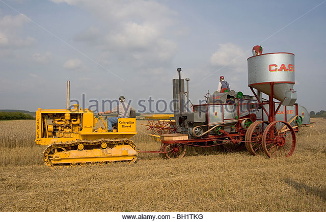 Caterpillar Diesel Forty and 1936 Case Q Combine Harvester - Stock ...