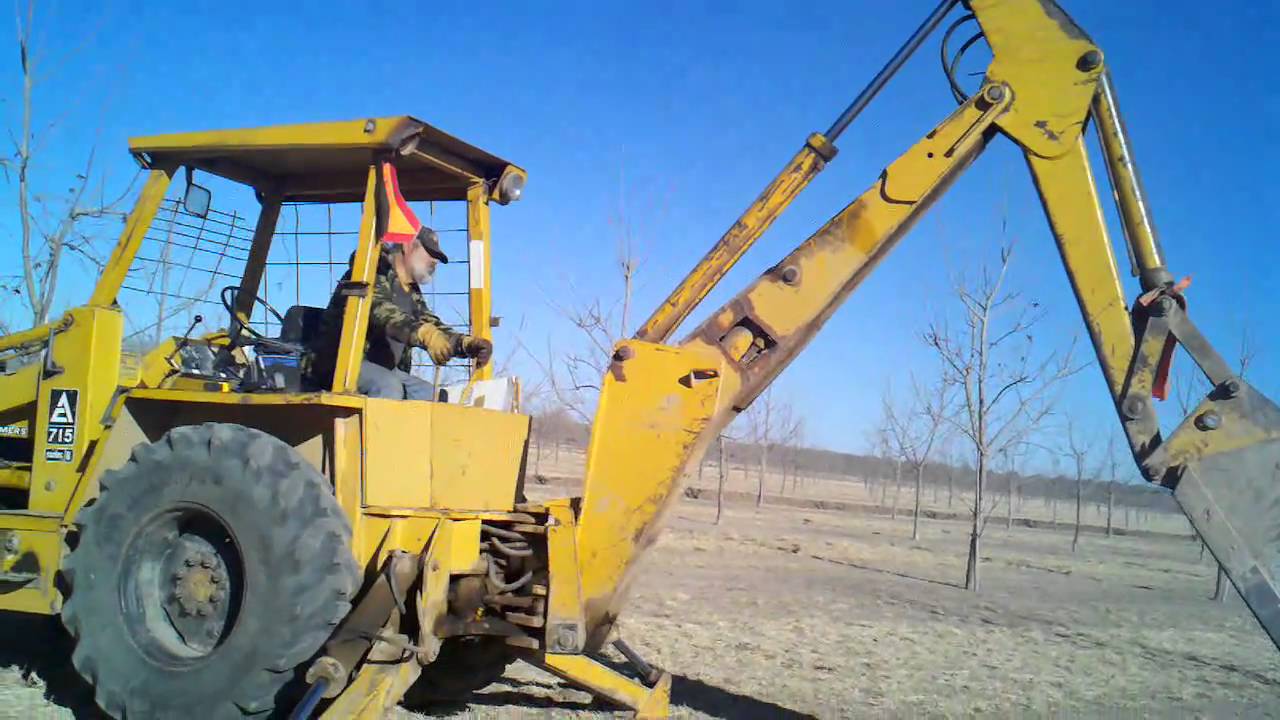 1979 Allis Chalmers 715 dig a pecan hole - YouTube