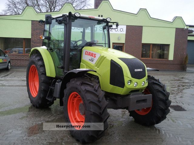 Claas AXOS 320C 2011 Agricultural Tractor Photo and Specs