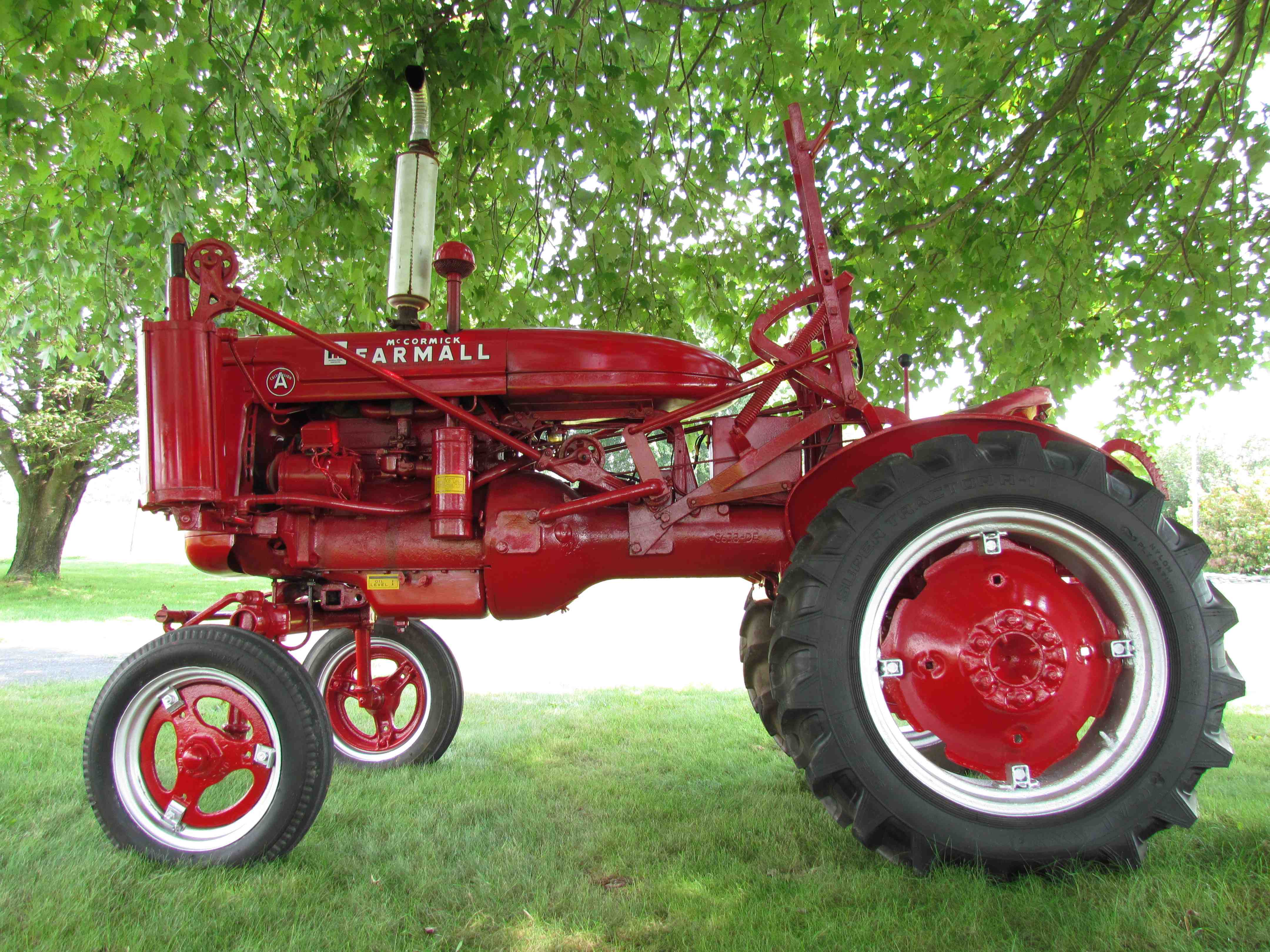 Farmall A with the Pneumatic Lift-All prominently displayed. This ...